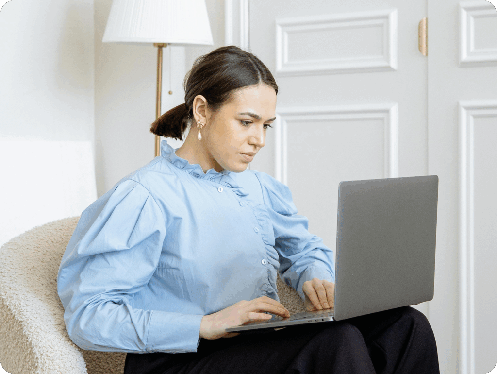 woman on computer developing a growth99 website