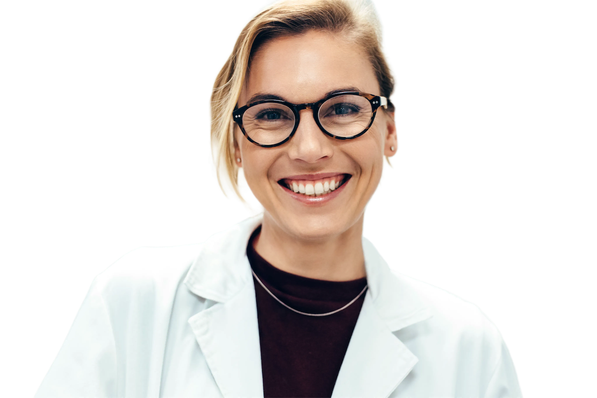 Headshot of a women in white coat smiling